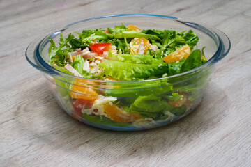 Salad with tangerine and ham