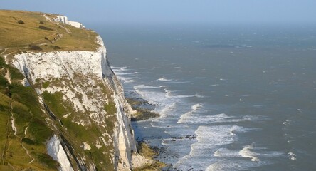 white cliffs of dover grass clear sky sea england