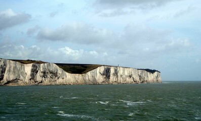 white cliffs of dover grass clear sky sea england