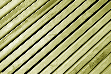 Yellow Weathered wooden planks texture with gaps.