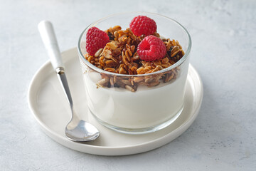 Diet dessert with yogurt, granola and fresh berries.