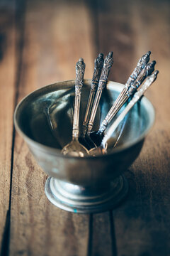 Collection of antique silver Apostle teaspoons in an old electro plated nickel silver sugar bowl