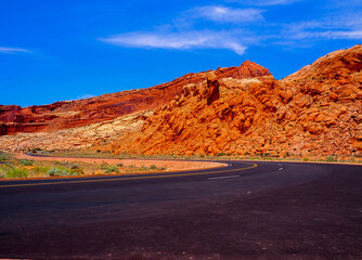 Road and  The sand arches in Arches national park, Utah, USA