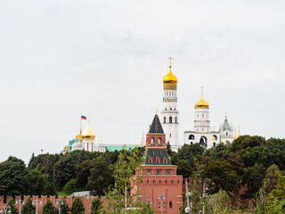 Fototapeta na wymiar view of Konstantino-EleninskayaTower and Ivan the Great Bell Tower of Moscow Kremlin from Zaryadye park in Moscow city in September