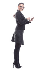 side view. smiling businesswoman reading a text message.