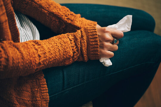 woman holding a tissue in her hand