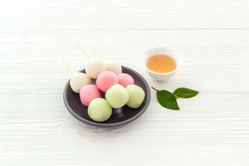 Asian cooking background - traditional sweets Dango, dumpling rice cake
