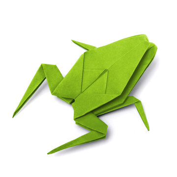 Origami paper frog on white background close up
