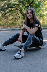 girls gna skateboard near the sports ground