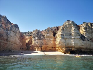 Fototapeta na wymiar Lagos, Algarve, stunning beaches with beautiful rocky formations and steep cliffs located in the South West of Portugal near Lagos. 