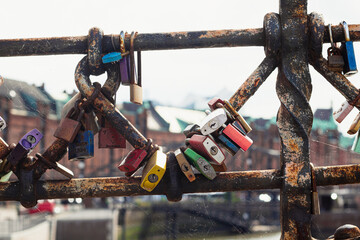 Colored love locks on a bridge in Hamburg, photographed up close.
