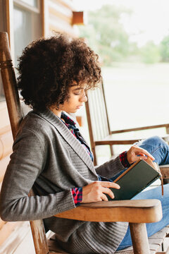 Young woman reading a book