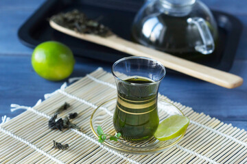 turkish green tea in a traditional glass glass