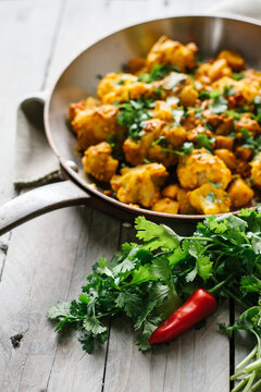 An Indian dish of cauliflower and potato.