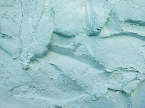 pastel blue textured cream coating background