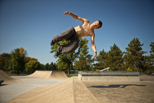 Young men freerunning