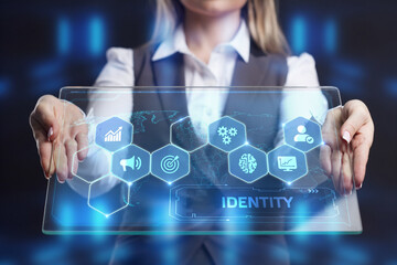 Business, Technology, Internet and network concept. Young businessman working on a virtual screen of the future and sees the inscription: Identity