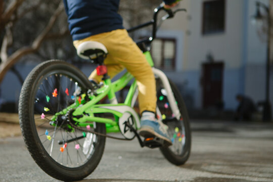 Boy riding pimped out bicycle
