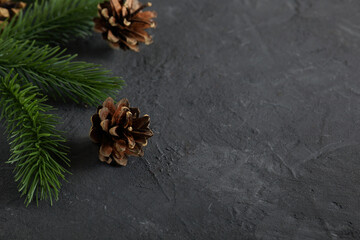 Christmas decoration on dark concrete with copy space. Xmas background. 