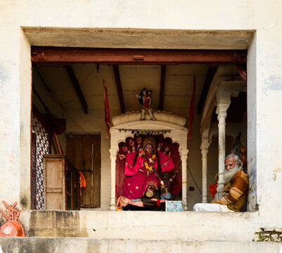 Indian Sadhu in front of small temple, Vrindavan