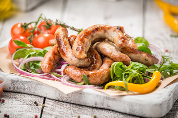 Grilled sausages and vegetables