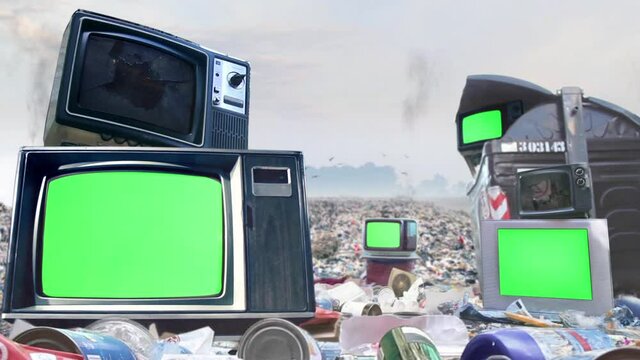 Old TV Sets with Green Screens with a Garbage Dump in the Background. Zoom In. You can replace green screen with the footage or picture you want. You can do it with &ldquo;Keying&rdquo; effect in After Effects.
