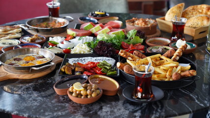 Turkish breakfast table in restaurant background. 