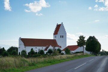 white church on Mon Island, blue sky, clouds