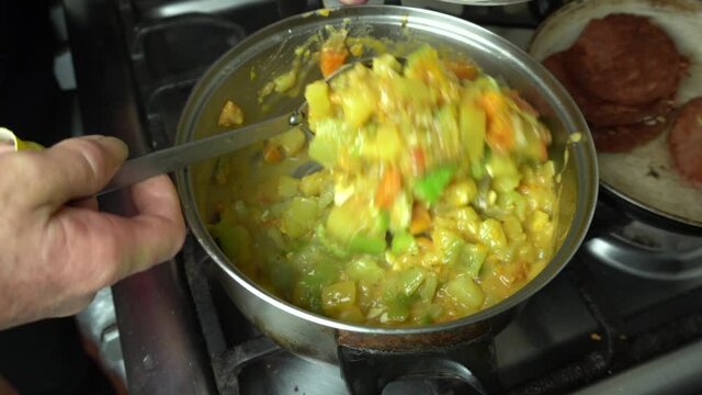 closeup ajiaco de caigua in a pot cooking, typical peruvian food made at home