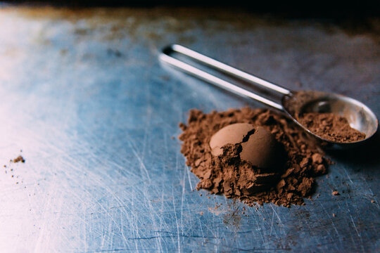 Mound of a teaspoon of cocoa powder