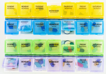 Studio shot of colorful pill containers