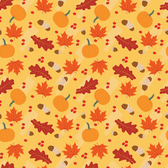 Oak and maple leaves, Acorns and berries and pumpkins seamless pattern to show the beauty of Autumn colors.