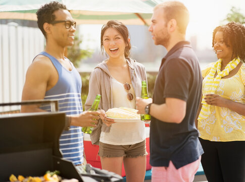 Group of friends enjoying barbeque