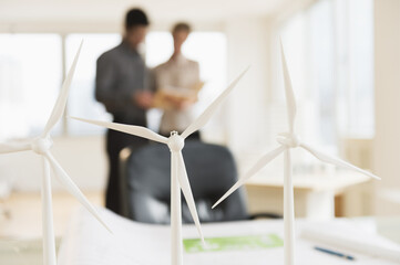 Scale models of wind turbines on office desk