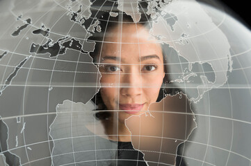 Digital portrait of young woman on world map