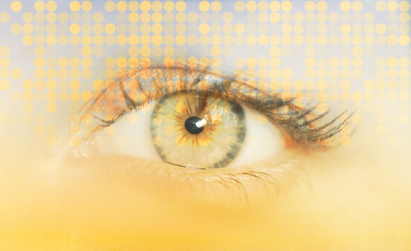 Close-up of female eye with digital pattern