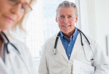 Portrait of smiling male doctor with stethoscope
