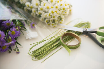 Studio shot of bouquets preparation