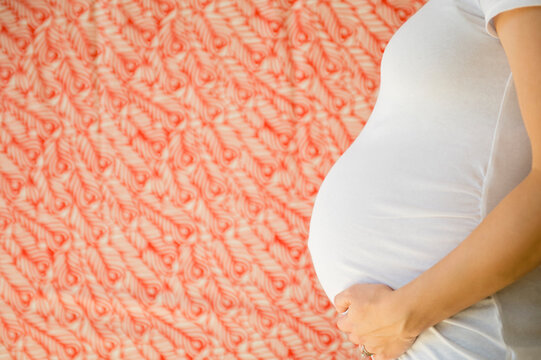 Side-view of pregnant woman