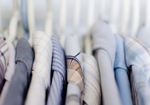 Close-up view of shirts in on rack