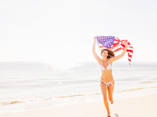 Woman holding American flag