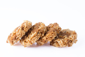 Thai Sweet Crispy Rice Cakes with Cane Sugar Drizzle. on white background 