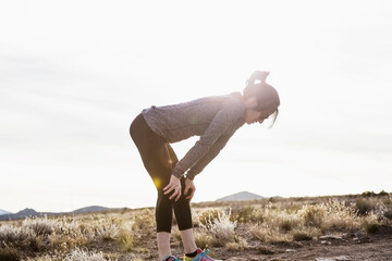 Female runner taking a break