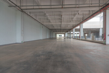 Large concrete warehouse indoor space