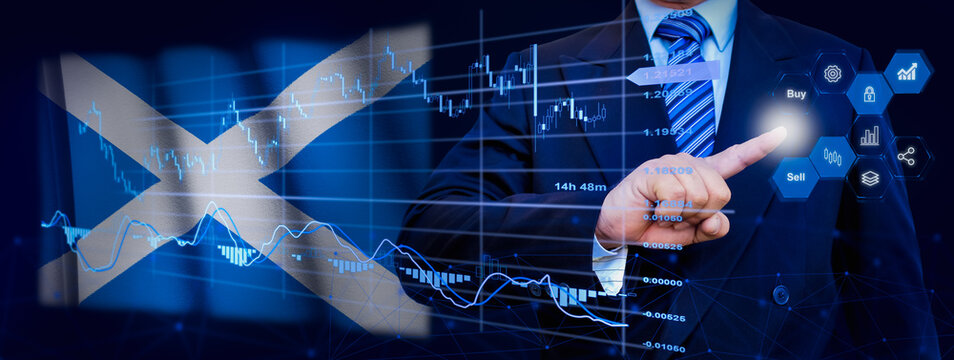 Businessman touching data analytics process system with KPI financial charts, dashboard of stock and marketing on virtual interface. With Scotland flag in background. - Powered by Adobe