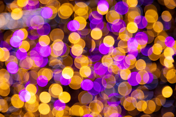 Golden and purple Lighting and decoration item for Christmas and New Year Celebration; Blurry Abstract concept