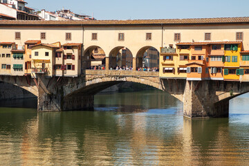 Fototapeta na wymiar Florence, Italy: Ponte Vecchio over the Arno river on a sunny day