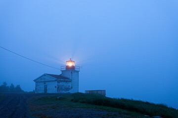 Port Bickerton Lighthouse in fog at dawn