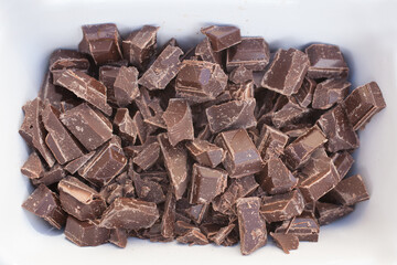Dark chocolate broken into small pieces for baking