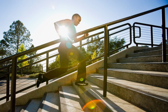Woman running on steps